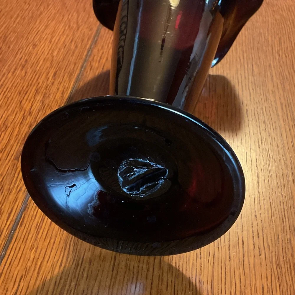 Elegant dark purple vase.